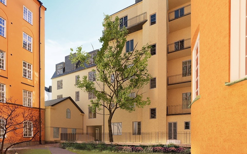 Innergård mellan flerbostadshus i gult, träd, fotomontage.